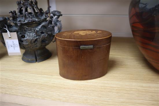 A George III inlaid mahogany oval tea caddy height 11cm